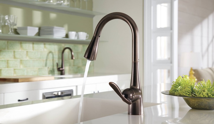Modern kitchen faucet dispensing water